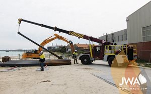 Man-portable beach road access matting